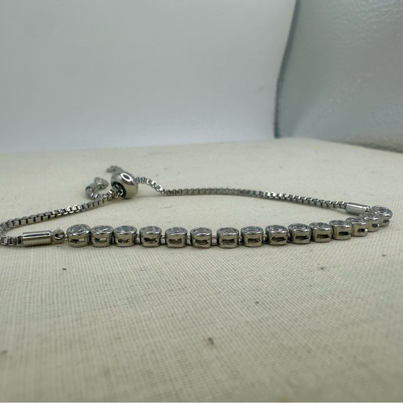 Classic Tennis Silver Tone Adjustable Bracelet with Crystals - Picture 2 of 6